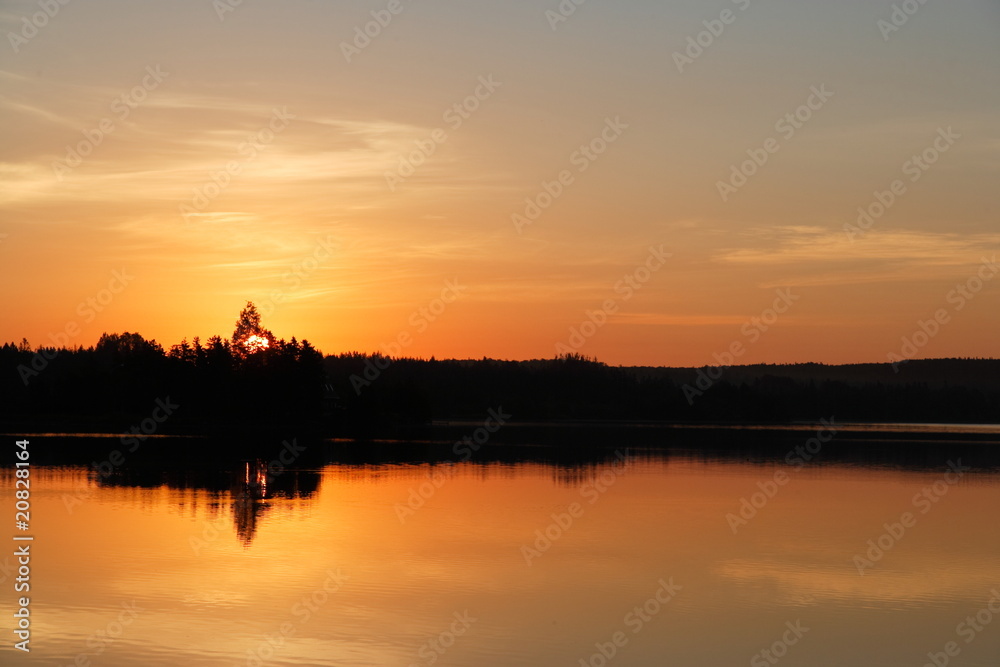 Sunrise behind lake with beautiful sky in Quebec, Canada