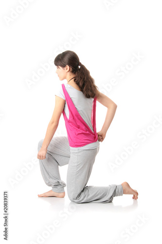 Teen woman training yoga