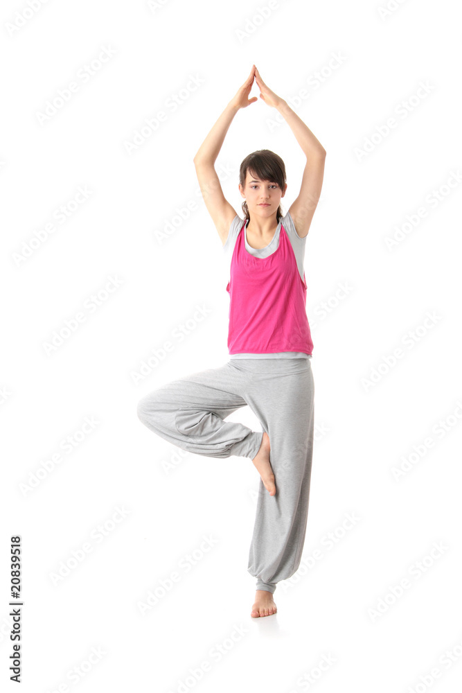 Teen woman training yoga