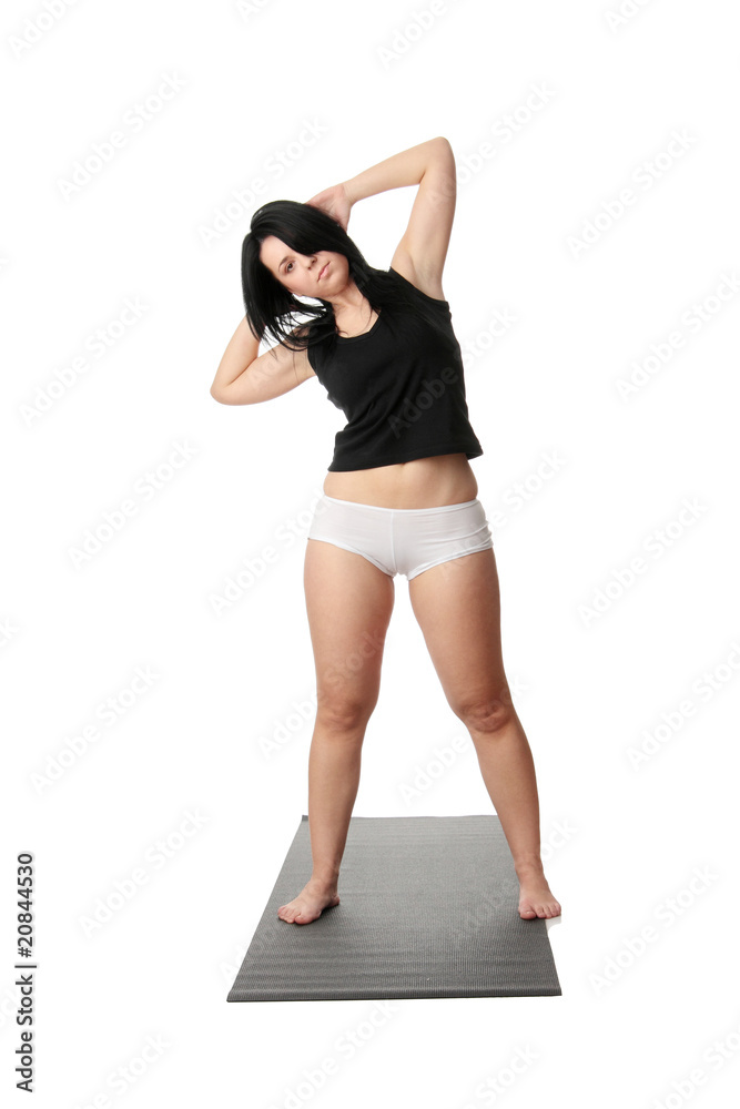 Fototapeta premium Corpulent woman training yoga