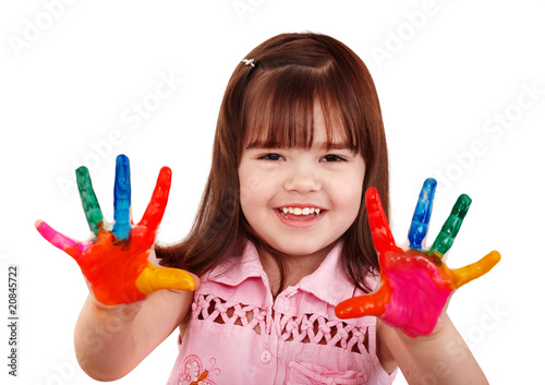 Happy child with colorful  painted hands. Isolated.