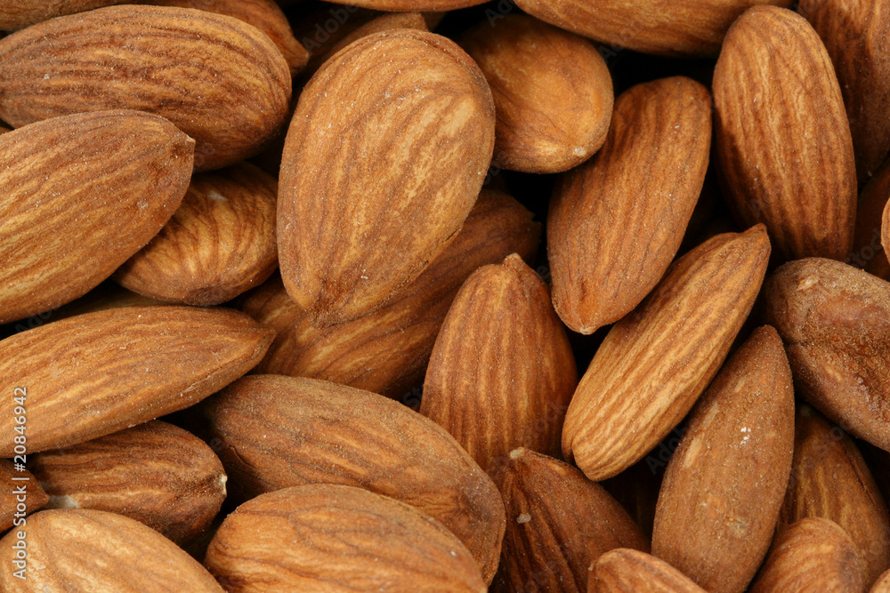 Raw almonds background Raw almonds background
