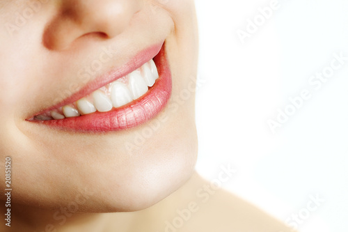 Fresh smile of woman with healthy teeth