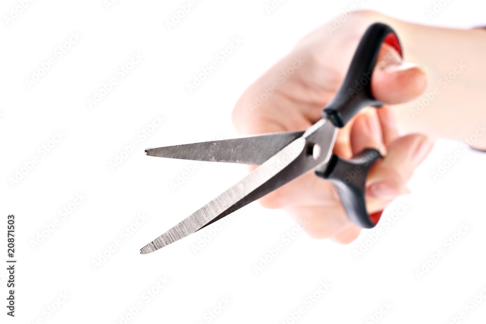 Obraz premium Scissors in hand isolated on white background.