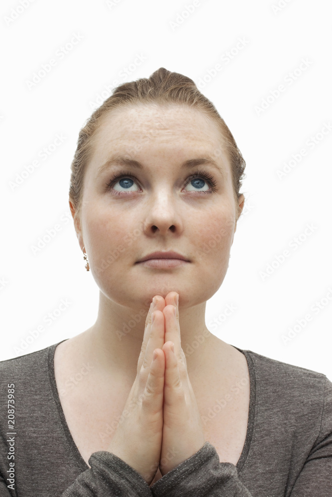 Worship - Cute christian woman praying to god Worship - Cute christian woman praying to god
