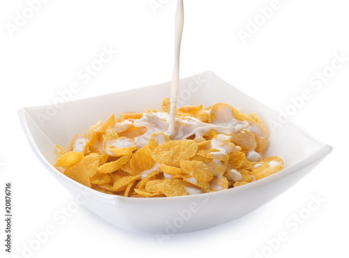Cornflakes and pouring milk