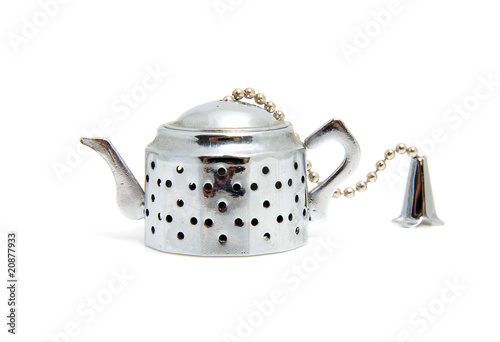 little silver teapot over white background