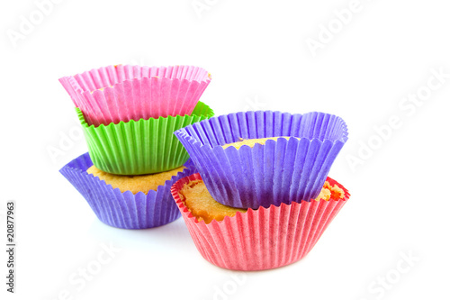Colorful home made cupcakes over white background