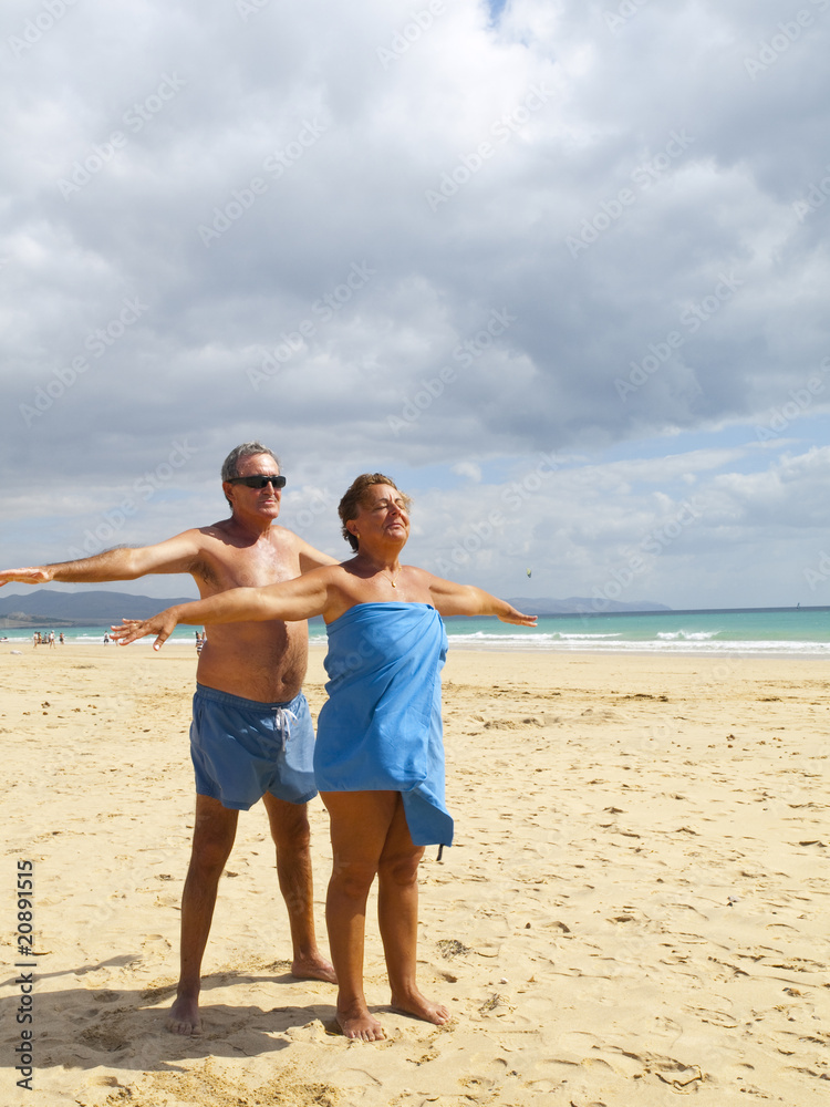 Senior Couple having fun in the beach