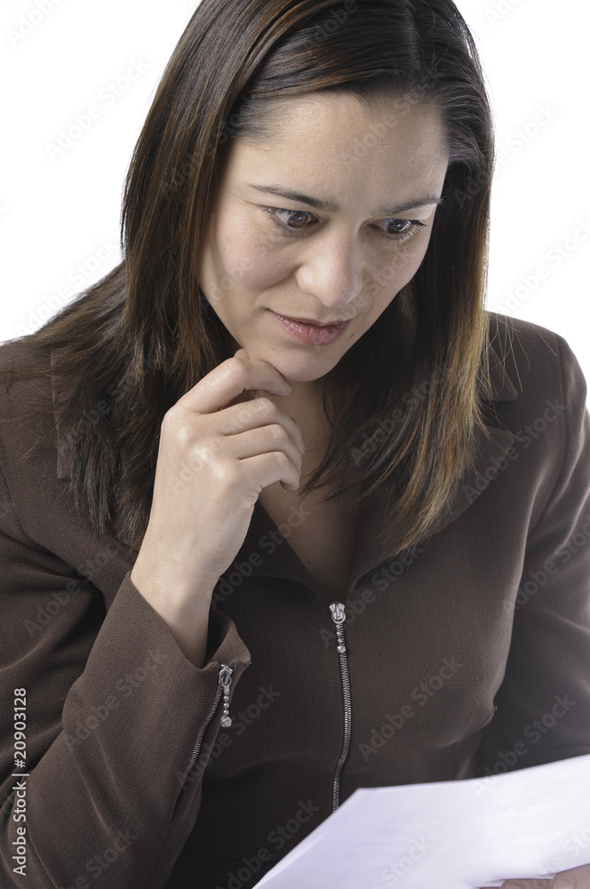 Young women reading a document. Young women reading a document.