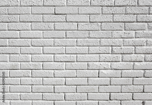 White painted blank brick wall background.