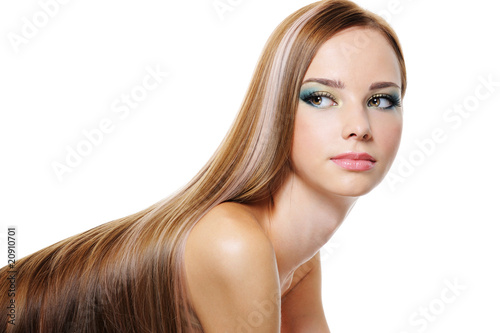 Beauty female with long smooth luxuriant hair