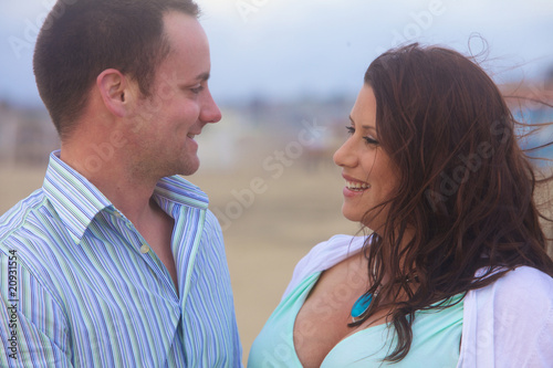 Young Pregnant Couple In Love