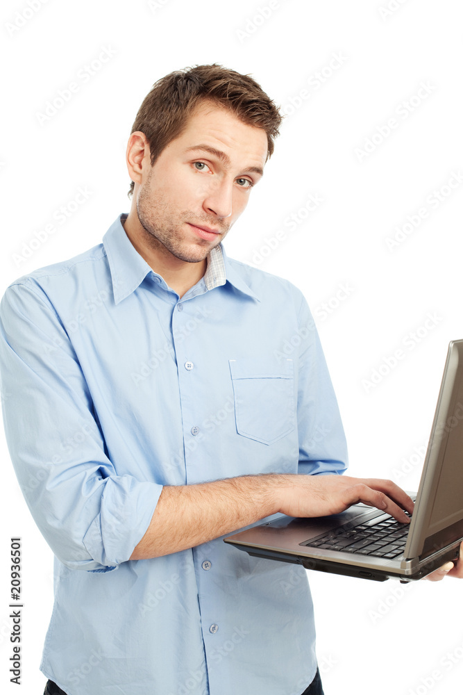 Young student typing on laptop Young student typing on laptop