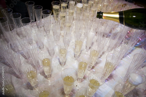 Filling Champagne Glasses Ready For Champagne Reception