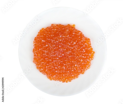 Red salmon eggs on a plate