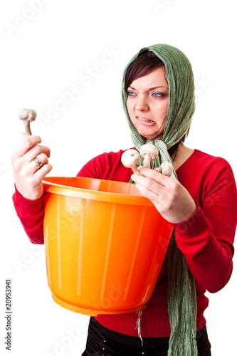 country woman with edible mushrooms