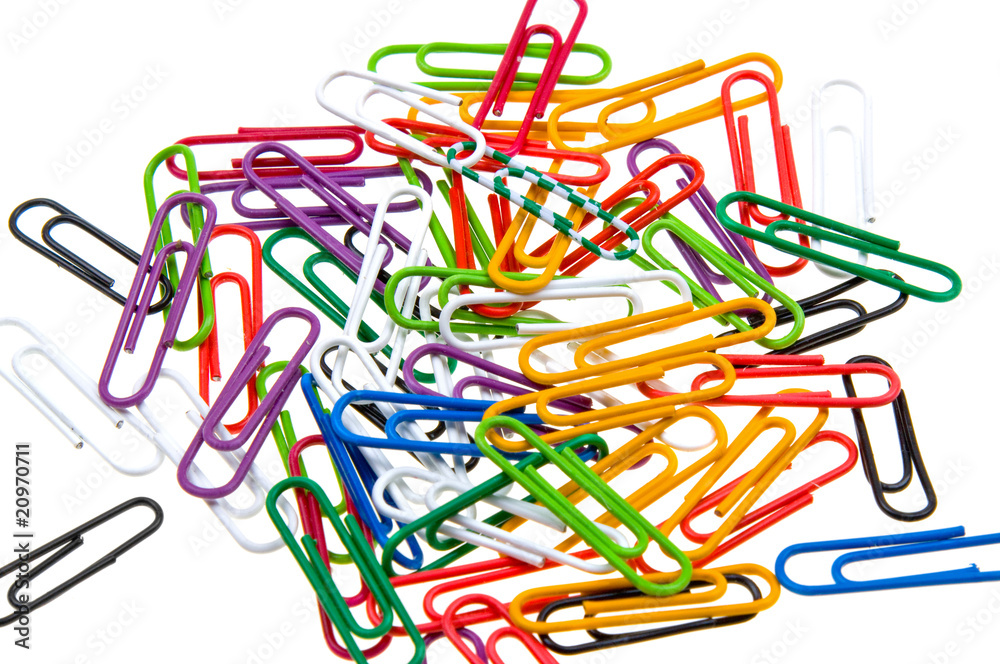 Color paper clips to background. Isolated on white Color paper clips to background. Isolated on white