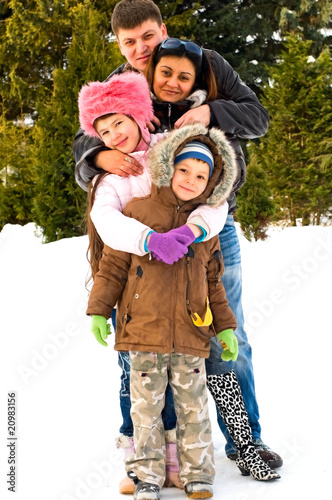 family in the winter park © Natalia Pavlova
