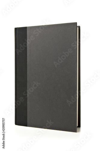 Black Book Standing Up on White Background