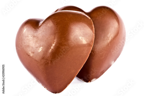 Pair of chocolate hearts close up isolated © Irina Rogova