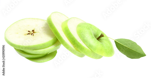Ripe fresh green apple cut with leaf