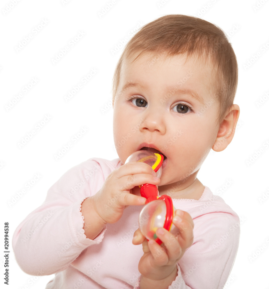 Little girl sucking toy