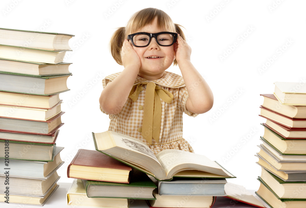 Happy little girl with books wearing black glasses Happy little girl with books wearing black glasses