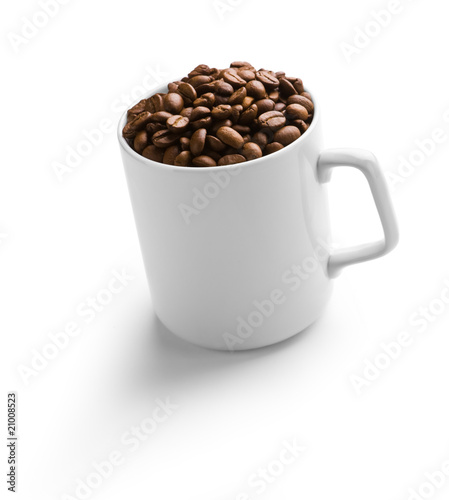 white coffee cup with coffee grains