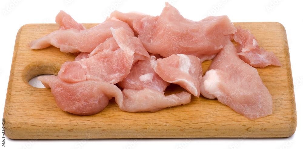 Pieces of fresh meat on cutting board