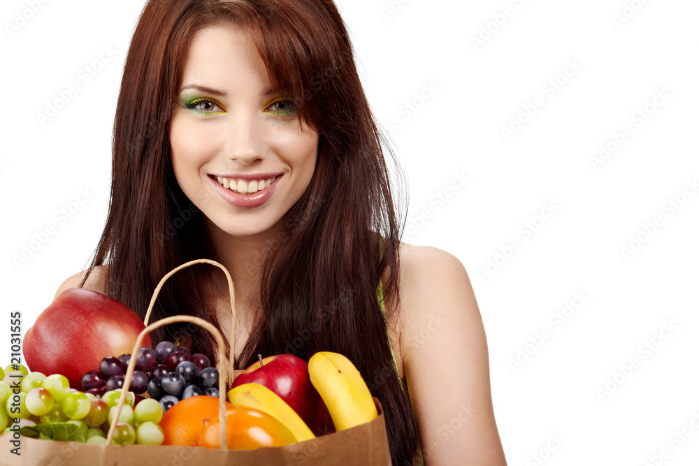 Smiling woman with fruits and vegetables. Over white background Smiling woman with fruits and vegetables. Over white background