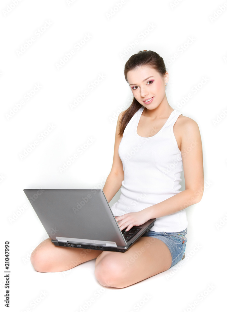 young beautiful girl with laptop over white young beautiful girl with laptop over white
