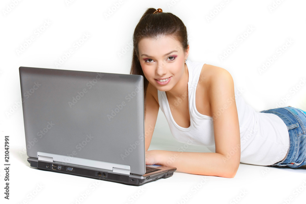 young attractive girl with laptop over white young attractive girl with laptop over white