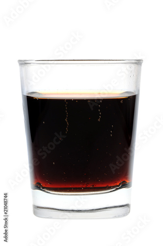 A glass of cola isolated on white background