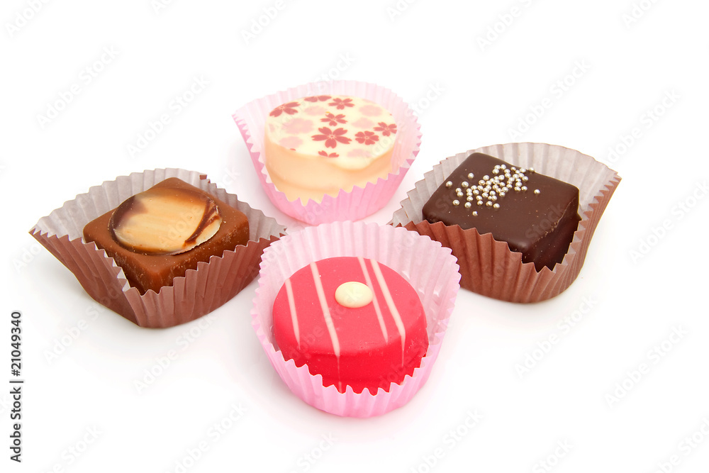 Delicious petit four over white background