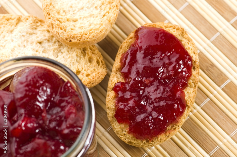 Breakfast of cherry jam on toast. Breakfast of cherry jam on toast.