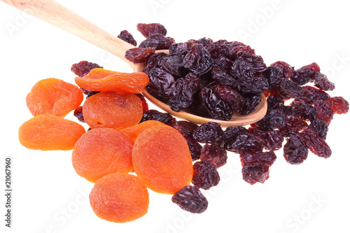 Dried fruits in a wood spoon