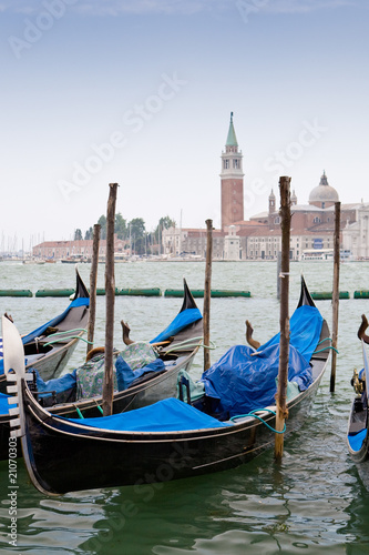 Blue and black gondolas on Grand canal