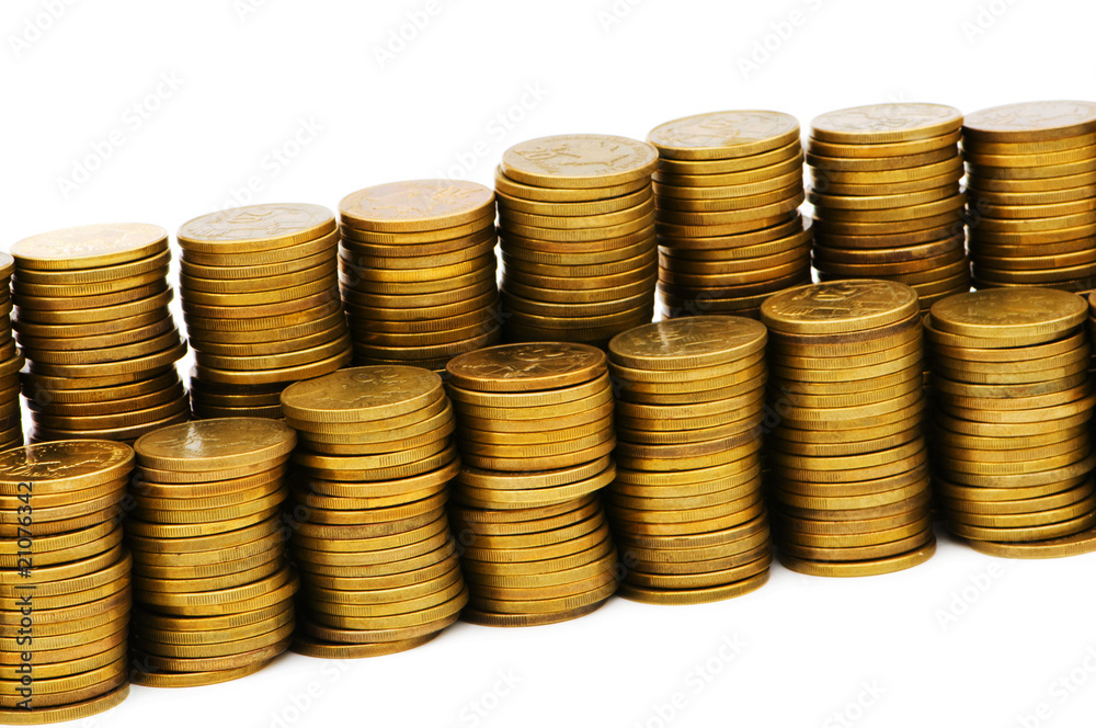 Stack of coins isolated on the white Stack of coins isolated on the white