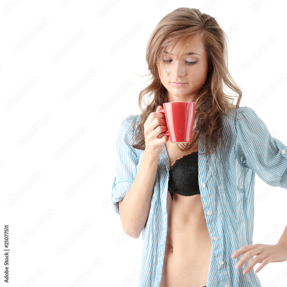 Woman drinks morning coffee or tea Woman drinks morning coffee or tea