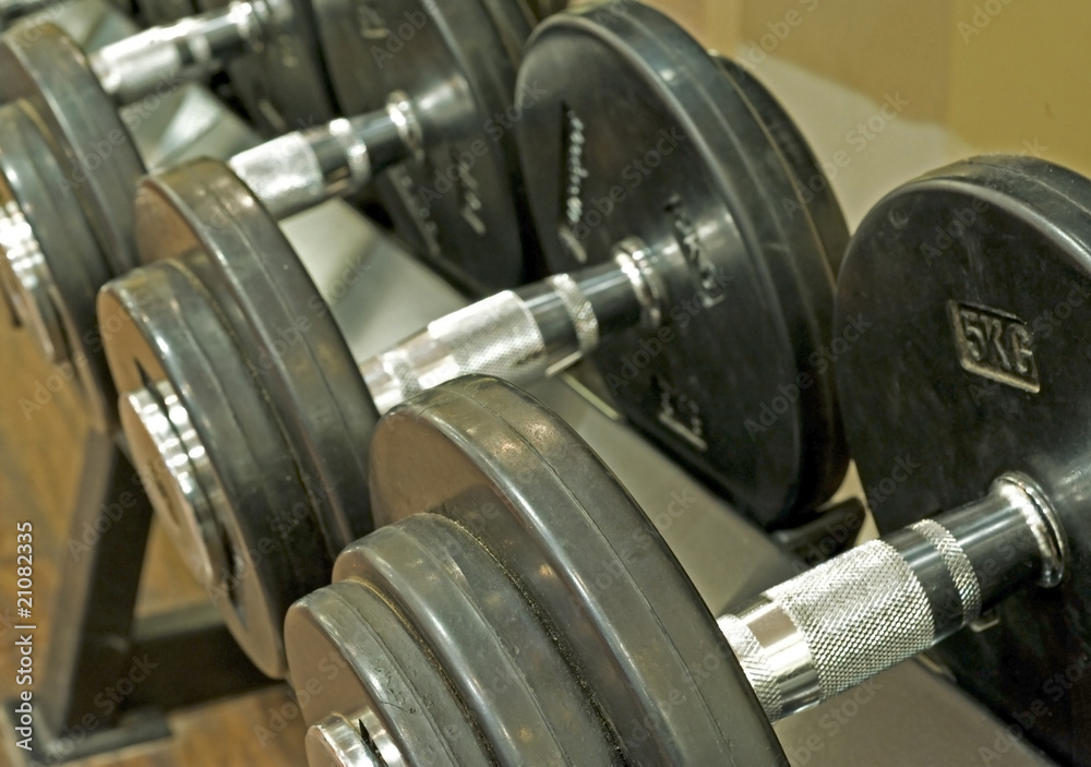 Dumbbell weights on a rack
