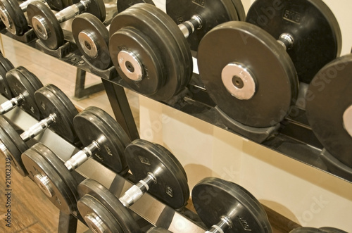 Dumbbell weights on a rack