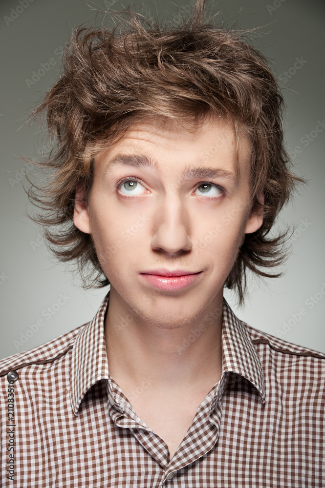 portrait of young man in shirt portrait of young man in shirt