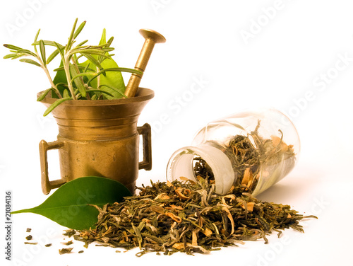 Mortar and pharmacy bottle, with herbs.