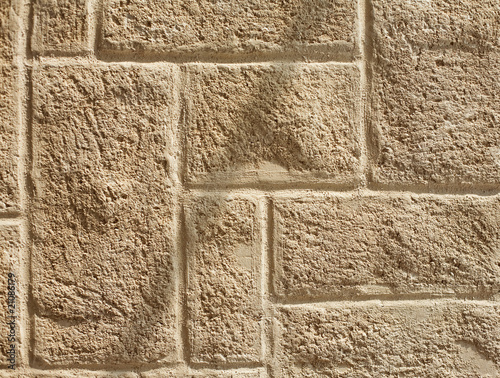 Obraz na plátně Ashlar wall with brickwork pattern