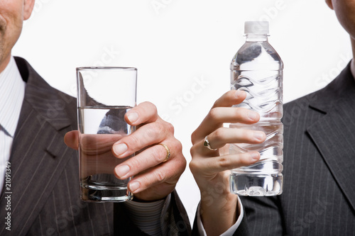 Businessmen holding water