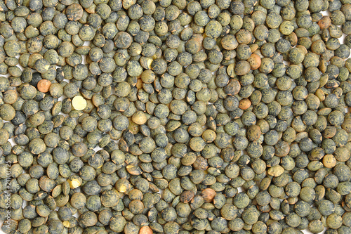 Fotografia Fond de lentilles vertes du Puy, arrière plan de légumineuses, nutrition et alim