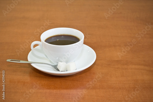 table with a cup of coffe