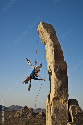Valokuva Female rock climber falling.