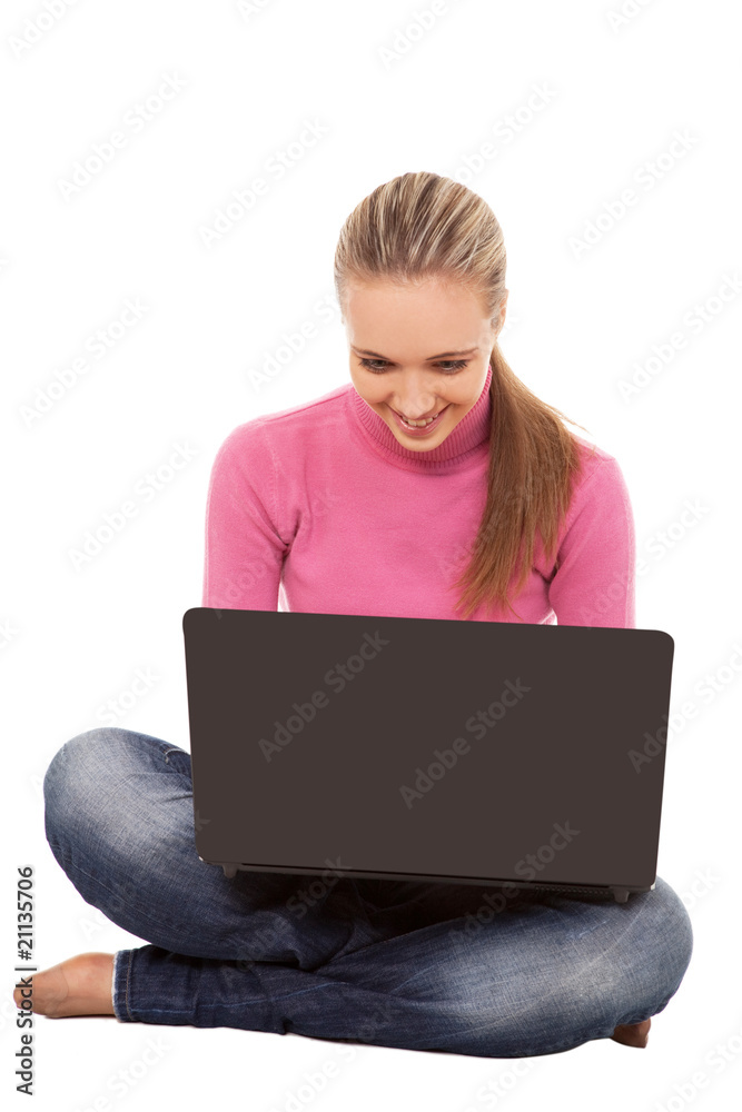 Teenager sitting with a laptop. Theme communication Teenager sitting with a laptop. Theme communication